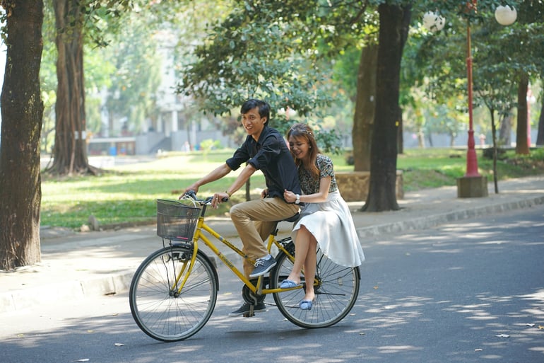 Couple on their bike. Healthy boundaries in relationships. 